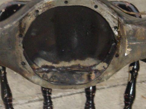 1989 Ford Bronco - This is a close-up view of a rear axle differential housing, showing signs of welding and wear.