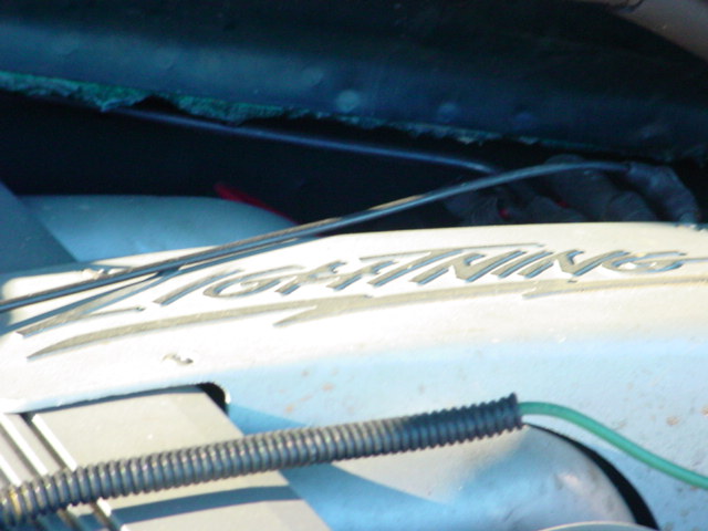 Close-up of 'Lightning' emblem on a vehicle part