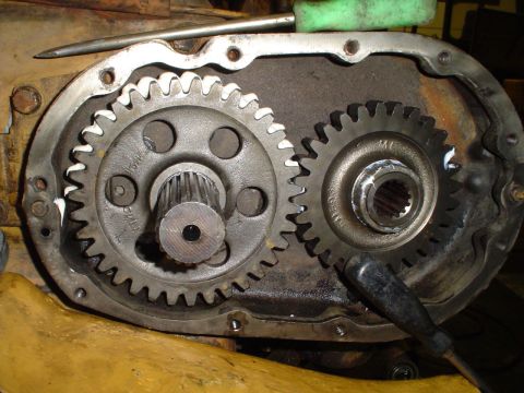 1966 International School Bus - Gears are visible within a metal housing, suggesting an internal mechanical component.