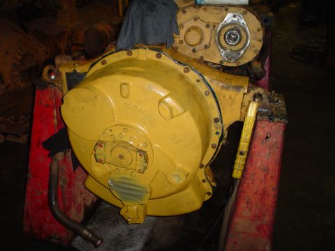 1966 International School Bus - A yellow engine component is shown, with visible part numbers and a watermark from Supermotors.net.