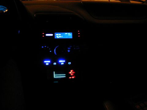 1995 Ford Probe - Center console at Night. Blue L.E.D. conversion to buttons. Blue L.E.D. 194's in A/C controls. JVC Head Unit