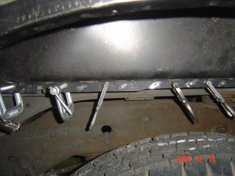 1989 Ford Bronco - Wheelwell floor clamped and ready.