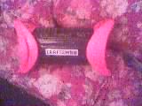 1986 Ford Bronco - A Craftsman tool is shown with pink handles on a floral fabric.
