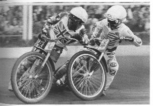 1997 Ford Crown Victoria - Motorcycle racers compete on a track, with one rider sporting a Union Jack design.