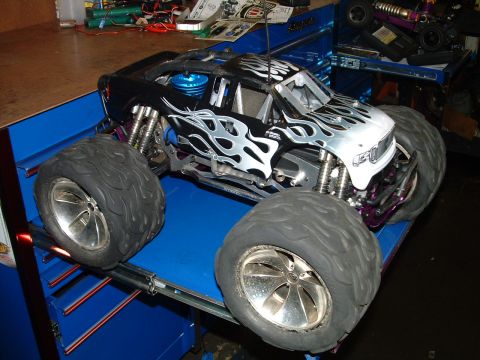 1994 Ford Bronco - This remote control monster truck has large tires and flame graphics.