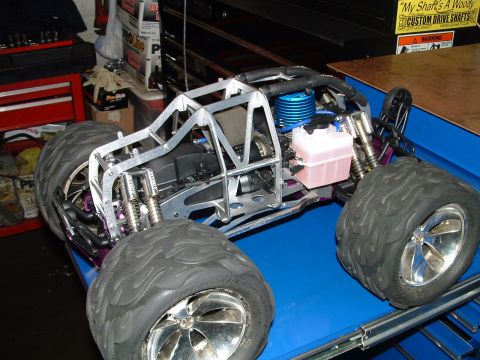 1994 Ford Bronco - A remote control monster truck is shown with its internal components visible.