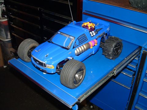 1994 Ford Bronco - This remote control truck is labeled "F350" and is displayed on a blue surface.