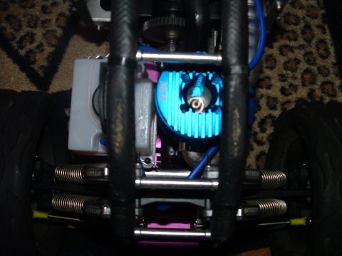 1994 Ford Bronco - Close-up view of the engine and suspension components on a remote control car.
