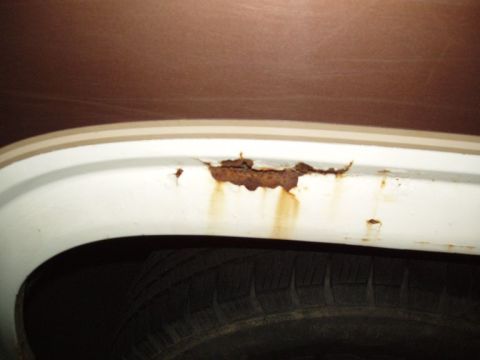 1985 Ford Bronco - Rusted right through the Rear quarterpanel. I will need to sand this down then repair it., (mechanic agree'd to help)