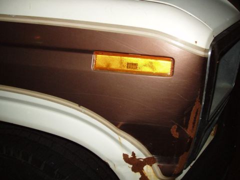1985 Ford Bronco - Poor fender. I hear this was caused when the truck was offroading and clipped another truck. The rust is only surface rust i believe.