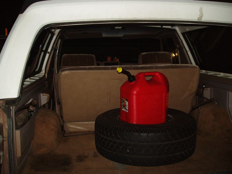 The nice cargo area...(carpeting will either be removed or replaced sometime in the future)

Spear tire and all its accesories (jack,tire iron,wood) came with it... i bought the gas can when i was taking the car home because the beast was out of gas when we went to remove it. I put 5 gallons in and it took it up to Empty.