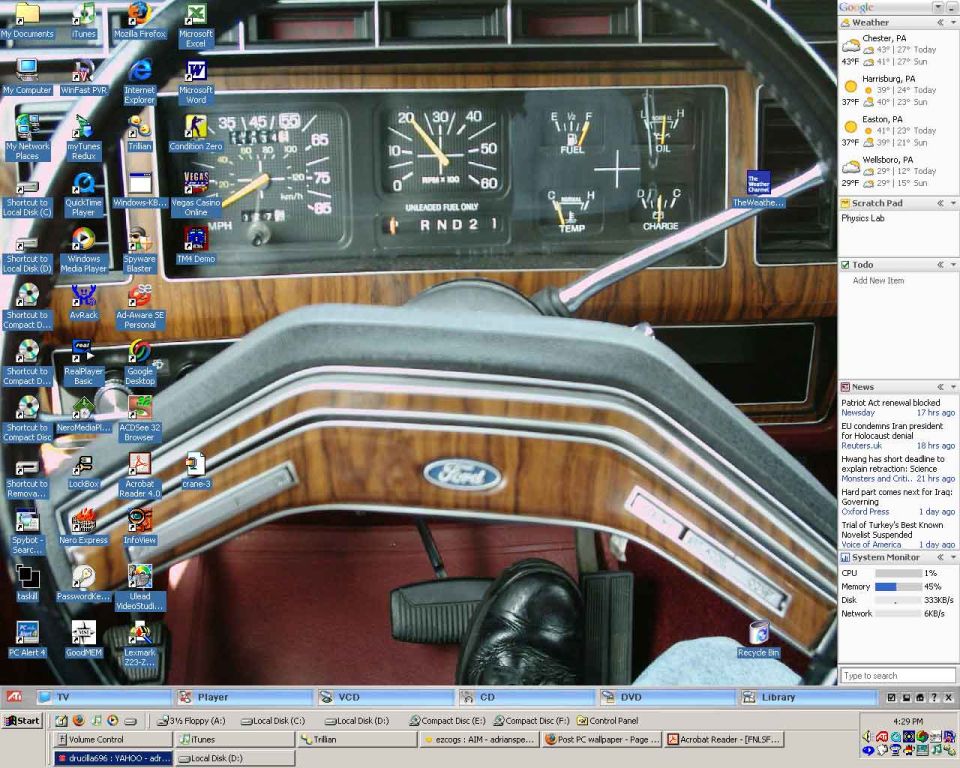 Windows XP desktop screenshot with a car dashboard wallpaper