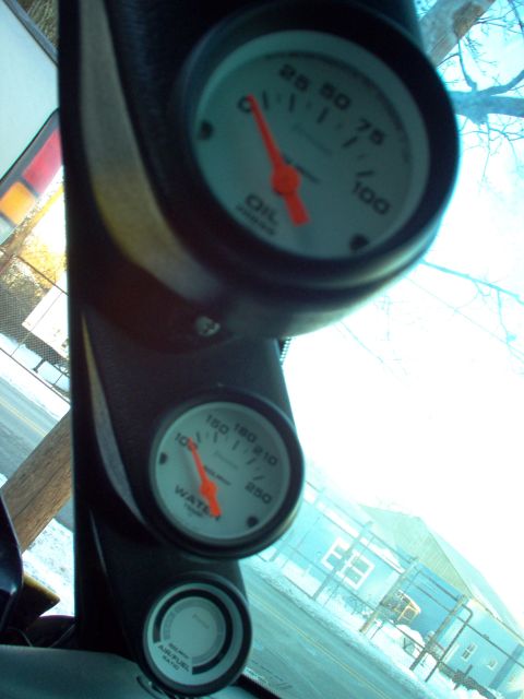 1994 Ford Probe - Interior view of dashboard gauges, including oil temperature, water temperature, and air-fuel ratio.