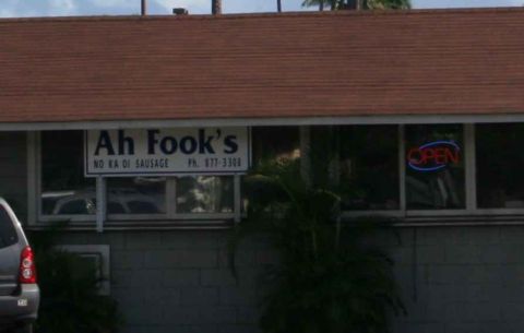 1979 Ford Bronco - Exterior view of Ah Fook's restaurant, a sign and an open neon light.