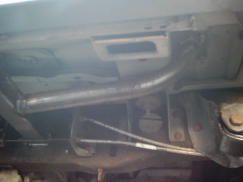 1978 Ford Bronco - Underside view of a vehicle's frame, showing the exhaust system and suspension parts.