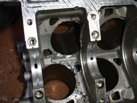 1995 Ford Taurus - The internal structure of an engine block shows significant damage to the cylinder walls.