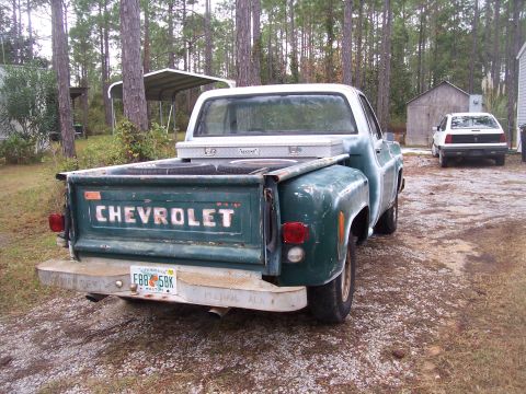 1974 Chevrolet C/K Pickup - Rear view of a 1974 Chevrolet C/K Pickup truck with a toolbox in the bed.