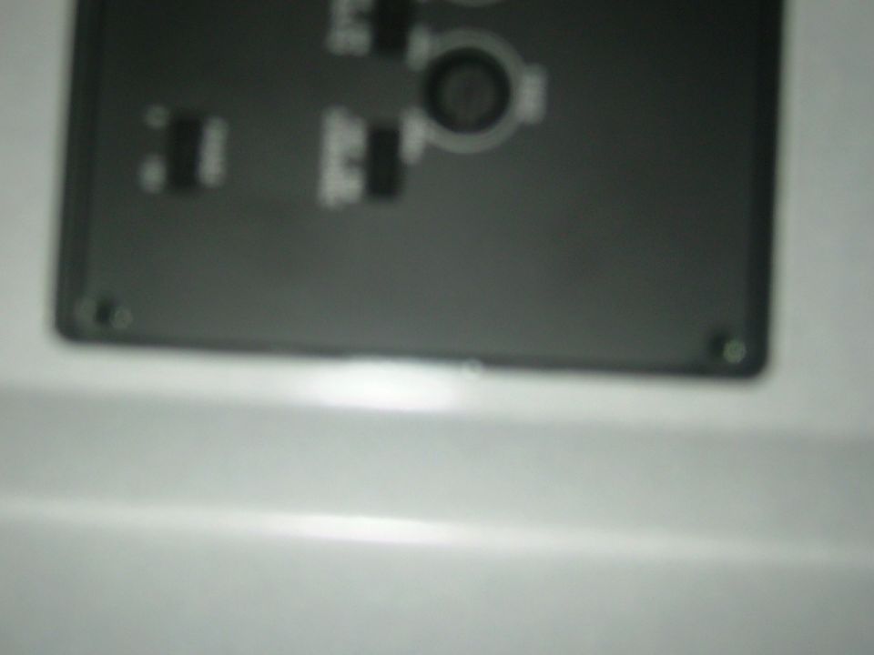 Dashboard panel with buttons and a circular dial