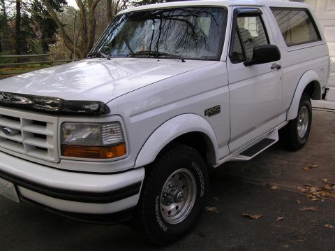 1996 Ford Bronco - factory aluminum wheels, added fender flares