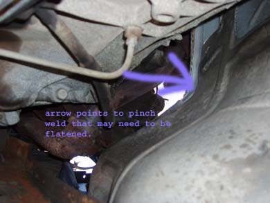 1995 Ford C-350 (Centurion Conversions) - Open passage w/ downpipe removed. Make note of pinchweld that may need to be bent back