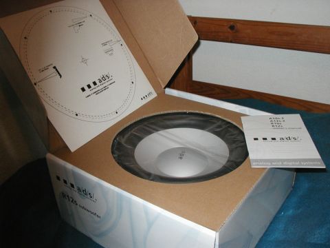 1999 Ford Crown Victoria - Unboxing a new ADS R12S subwoofer, complete with installation guide and template.