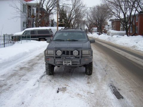 1996 Jeep Grand Cherokee - This 1996 Jeep Grand Cherokee is equipped with a heavy-duty aftermarket bumper and winch, ready for winter conditions.