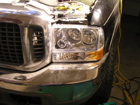 2000 Ford Excursion - Front view of a 2000 Ford Excursion showing the grille and headlight assembly.