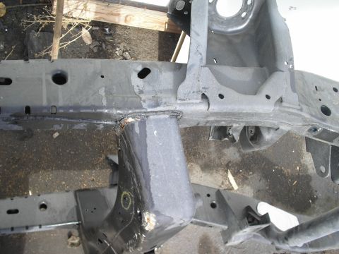 1991 Ford Taurus - This is a section of a vehicle's frame, showing structural components and attachment points.