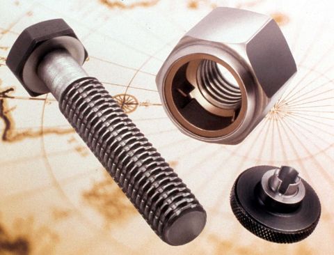 1984 Ford Bronco - Close-up of a bolt and nut assembly, with a knurled knob visible in the lower right corner. The background appears to be a map.