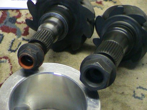 1979 Ford Bronco - Close-up view of differential gears and axle shafts, with visible nuts and splines.