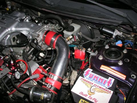 1996 Ford Probe - Customized engine bay aftermarket performance parts and a Summit Racing flywheel box.