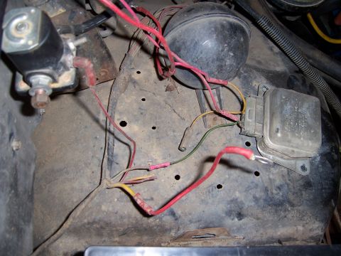 1983 Ford Bronco - Engine bay wiring and electrical components are visible in this close-up shot.