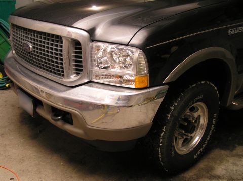 2000 Ford Excursion - Front view of a 2000 Ford Excursion showing the grille, headlights, and bumper.