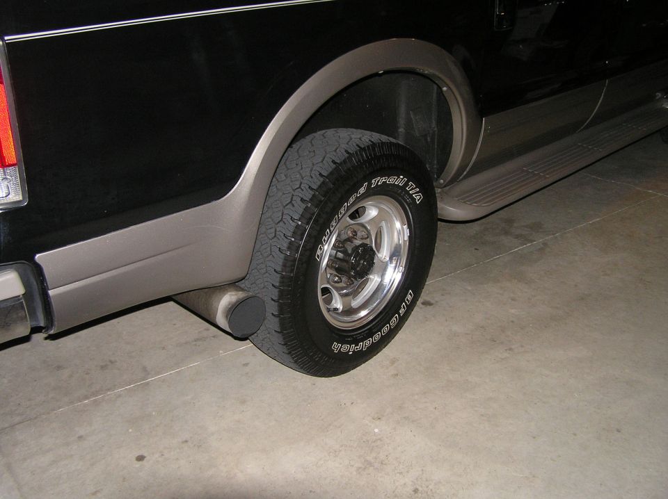 Black Ford SUV rear wheel with alloy rim and BFGoodrich Rugged Trail T/A tire