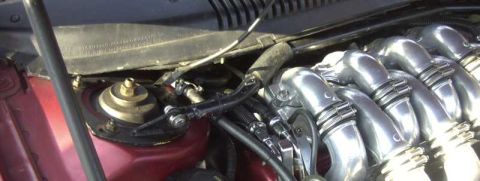 1997 Ford Taurus - Close-up view of a shiny engine intake manifold, likely from a performance vehicle.