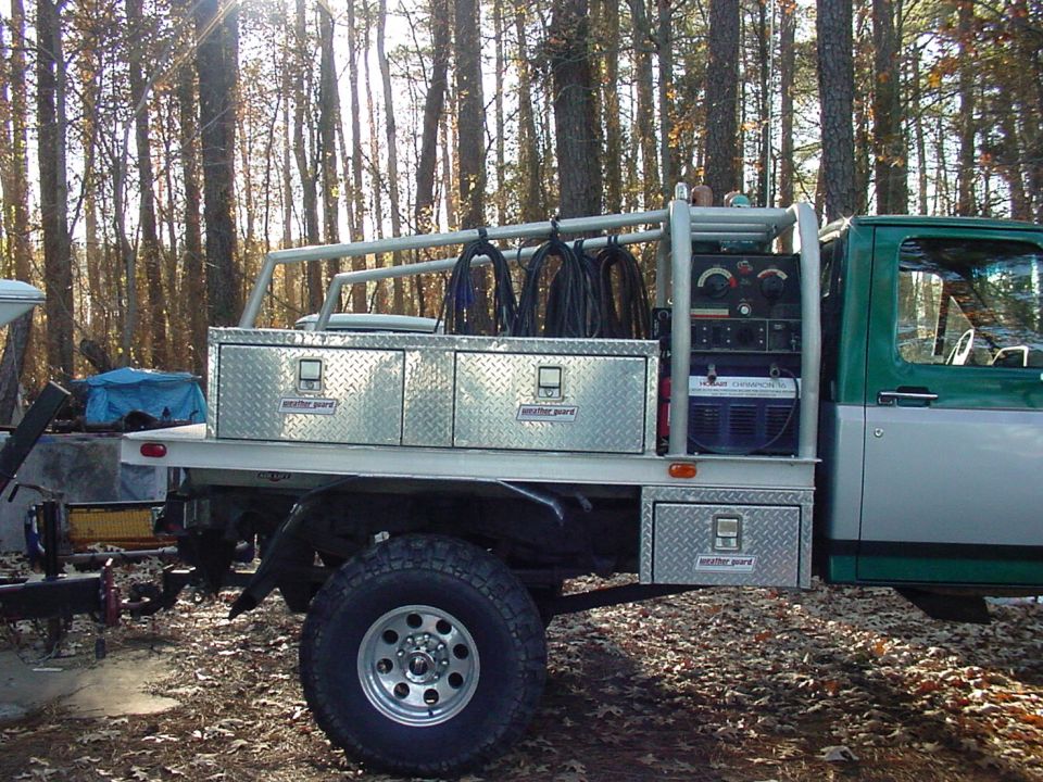 1989 Ford F-250 with a custom welding bed, diamond plate toolboxes, and welding equipment