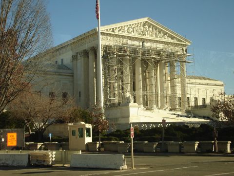 1994 Ford Bronco - The Supreme Court building is under renovation with scaffolding covering its facade.
