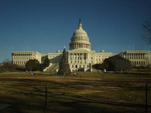 1994 Ford Bronco - The US Capitol Building stands tall against a clear blue sky, with a large Christmas tree in front.