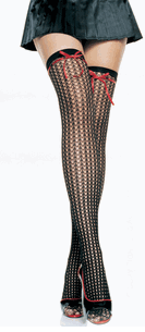 1989 Ford Bronco - A close-up shot focuses on a woman's legs, adorned in sheer black stockings and high heels.