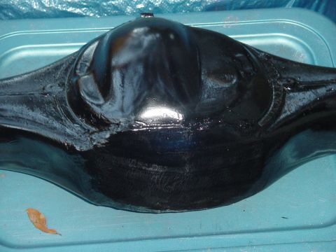 1989 Ford Bronco - Close-up of a rear differential housing, likely a vehicle part.