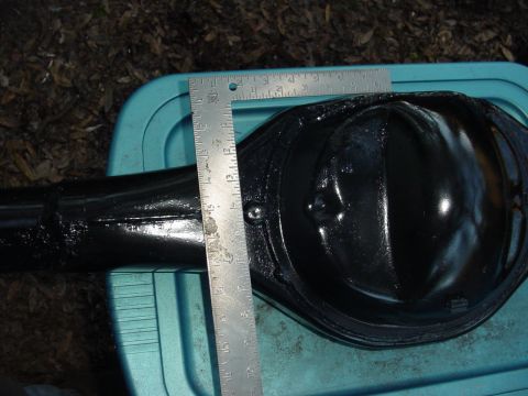 1989 Ford Bronco - A differential housing is measured with a ruler, with a Supermotors.net watermark visible.