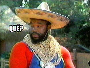 1994 Ford Bronco - Image macro of a man in a straw sombrero, gold chains and a red long-sleeve shirt with blue vest, captioned "QUÉ?" in white text. No vehicl…
