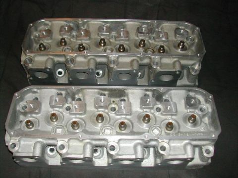 1971 Ford Mustang - Pair of aluminum cylinder heads, likely for a V8 engine, shown from the valve cover side.