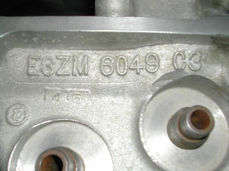 Aluminum cylinder head casting stamped Ford part number E3ZM 6049 C3
