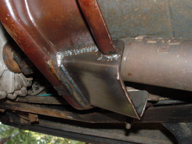 tranny crossmember notched and clearanced for the driveline