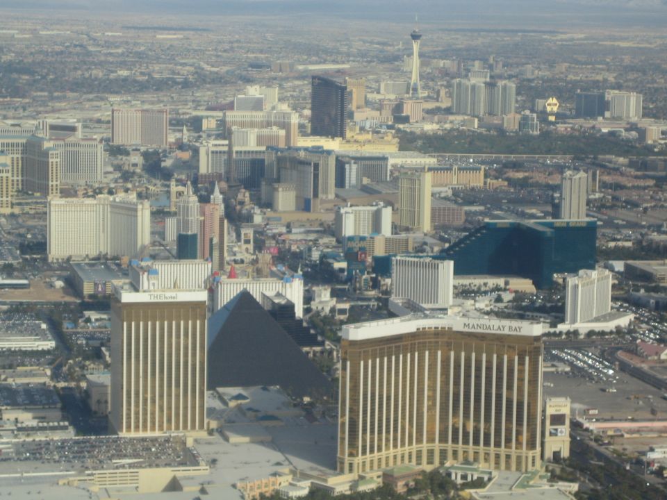 Aerial view of Las Vegas Strip hotels including The Hotel, Luxor, and Mandalay Bay