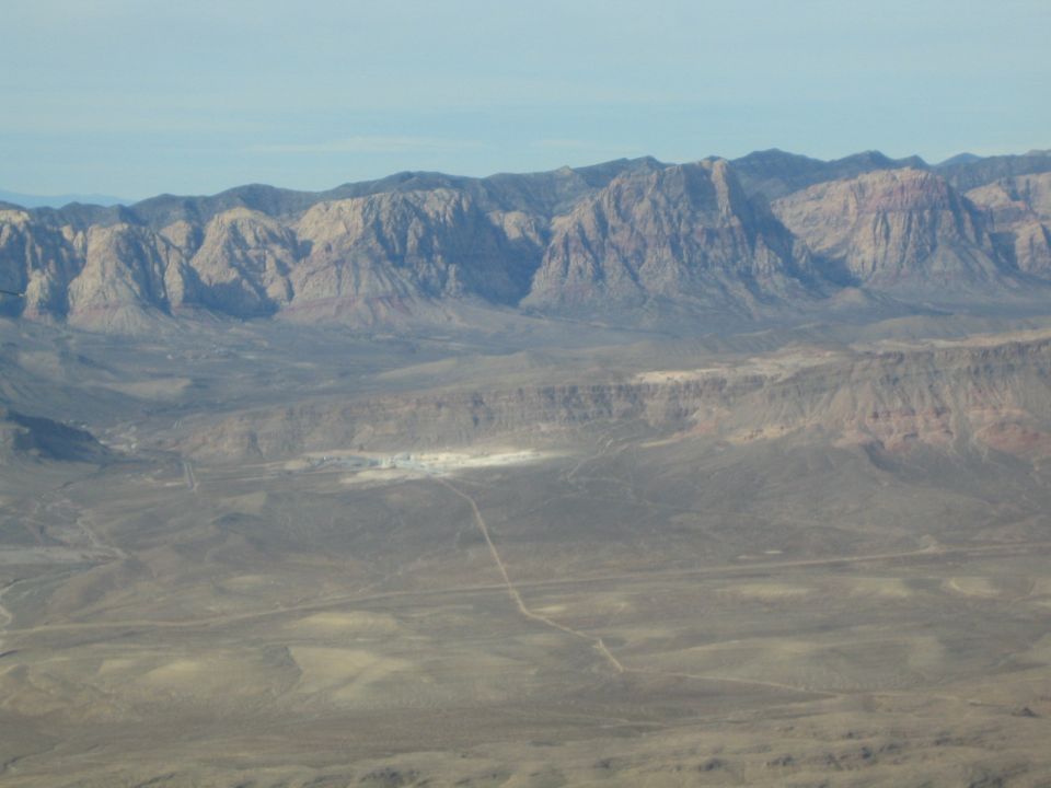 Desert landscape with mountains under a clear sky