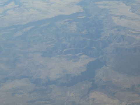 1968 Ford Mustang - An aerial perspective reveals the immense scale and geological features of a canyon system.