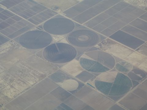 1968 Ford Mustang - Agricultural landscape showing patterns of center pivot irrigation systems from above.