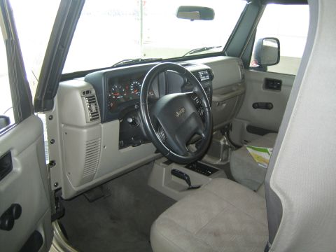 1968 Ford Mustang - Interior view of a Jeep, likely a Wrangler, showing the dashboard and front seats.